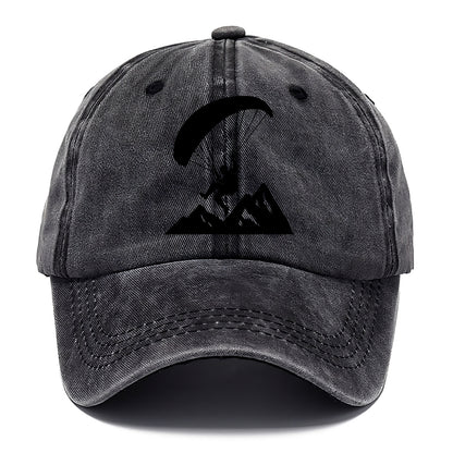 Paraglider soaring over mountain peaks - Classic Cap - Graphite