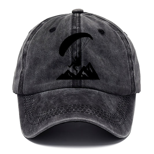 Paraglider soaring over mountain peaks - Classic Cap - Graphite