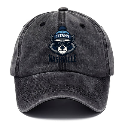Nashville Raccoon wearing Titans navy and light blue beanie with pom pom and wayfarer - Classic Cap - Graphite