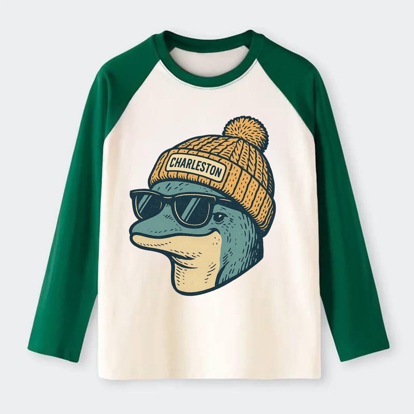 Charleston Dolphin wearing Charleston beanie with pom pom and wayfarer - Raglan Long Sleeve T-Shirt - Green