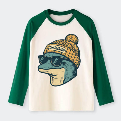 Charleston Dolphin wearing Charleston beanie with pom pom and wayfarer - Raglan Long Sleeve T-Shirt - Green