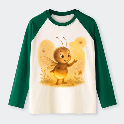 Firefly choreographer arranging synchronized light patterns over a - Raglan Long Sleeve T-Shirt - Green