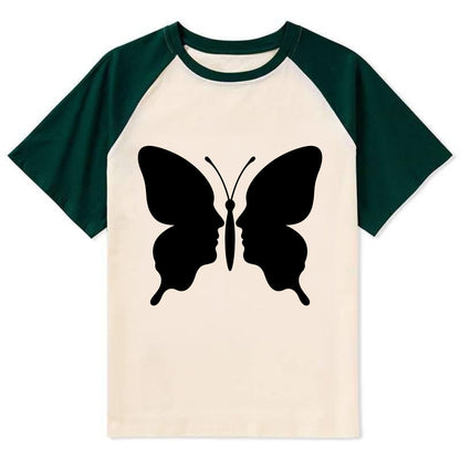 Butterfly wings - negative space reveals hidden faces or patterns - Contrast Raglan T-shirt - Green