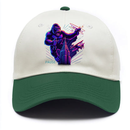 giant gorilla on top of skyscraper holding small figure, swatting planes - Two Tone Cap - Green