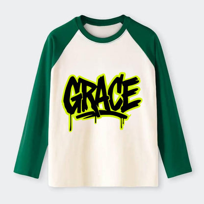 Bold typography design - "GRACE" - elegance under pressure, divine - Raglan Long Sleeve T-Shirt - Green