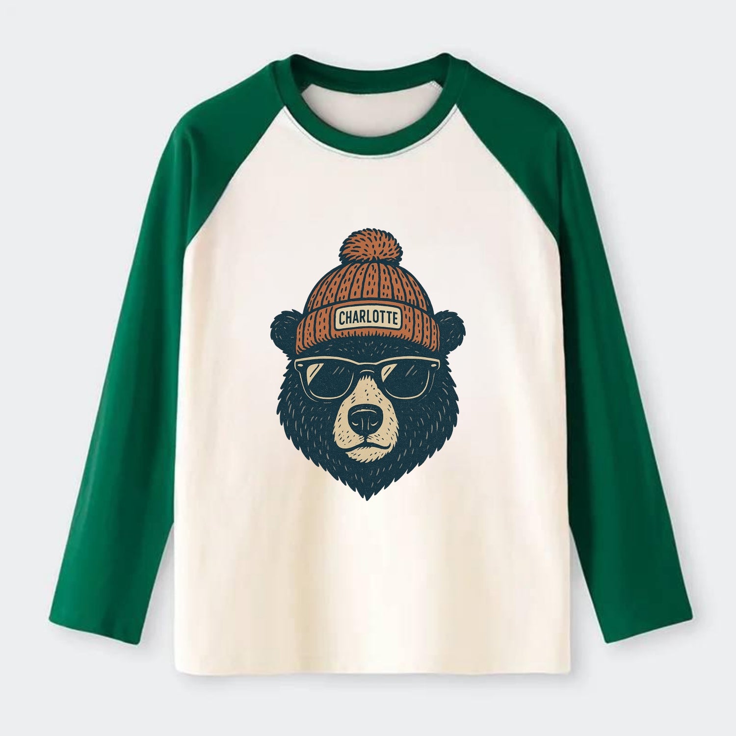 North Carolina Black Bear wearing Charlotte beanie with pom pom and - Raglan Long Sleeve T-Shirt - Green