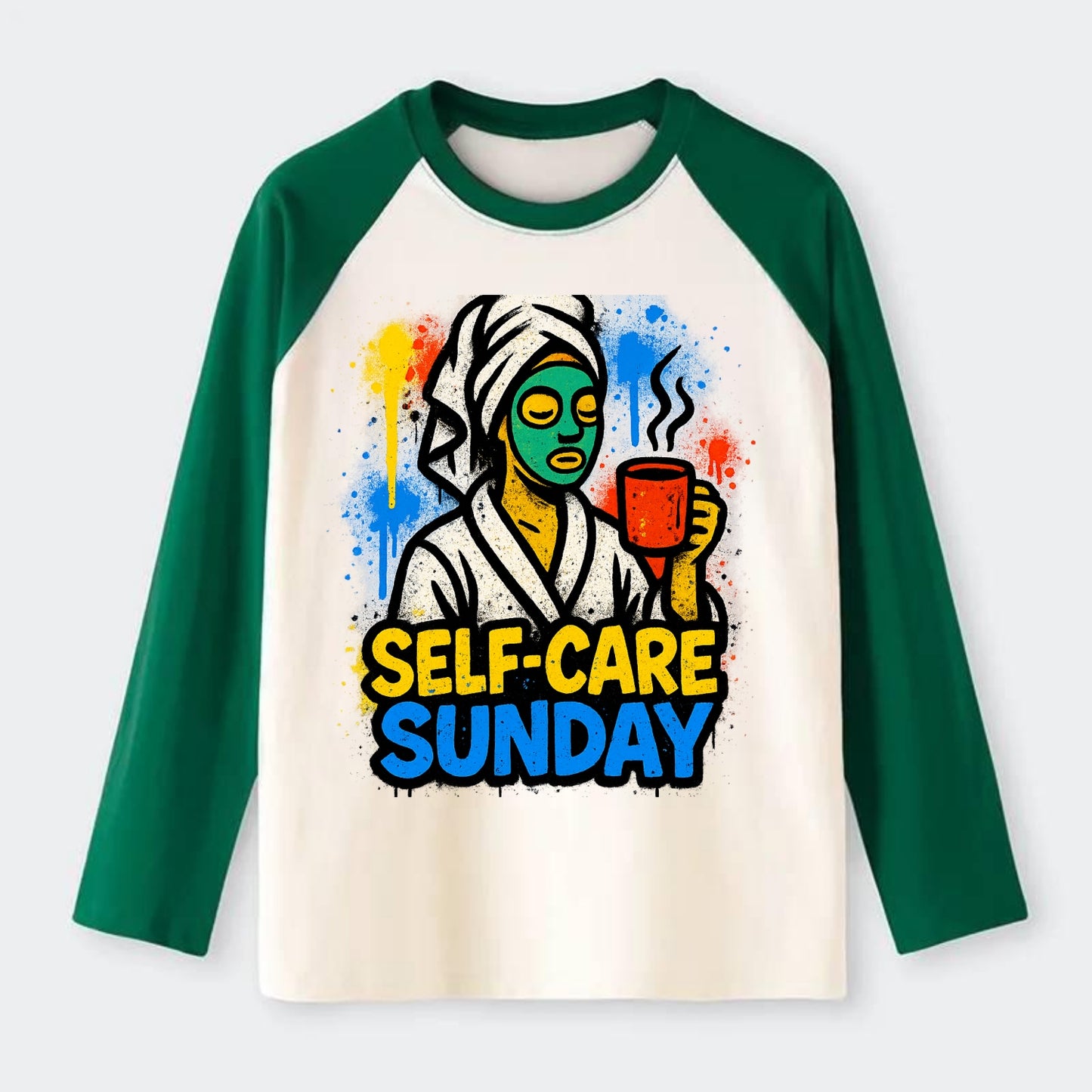 Person in bathrobe with face mask and tea - self-care Sunday ritual, - Raglan Long Sleeve T-Shirt - Green