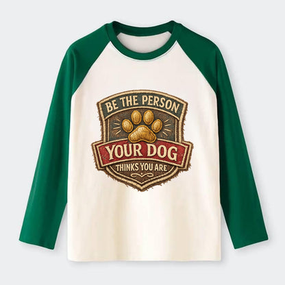 BE THE PERSON YOUR DOG THINKS YOU ARE - inspirational with paw in gold - Raglan Long Sleeve T-Shirt - Green