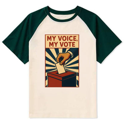 Hand dropping ballot into box with determination - "My Voice, My Vote" - - Contrast Raglan T-shirt - Green