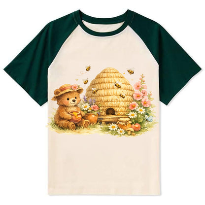 SKEP HIVE | Traditional straw beehive | Cottage garden setting | Buzzing - Contrast Raglan T-shirt - Green