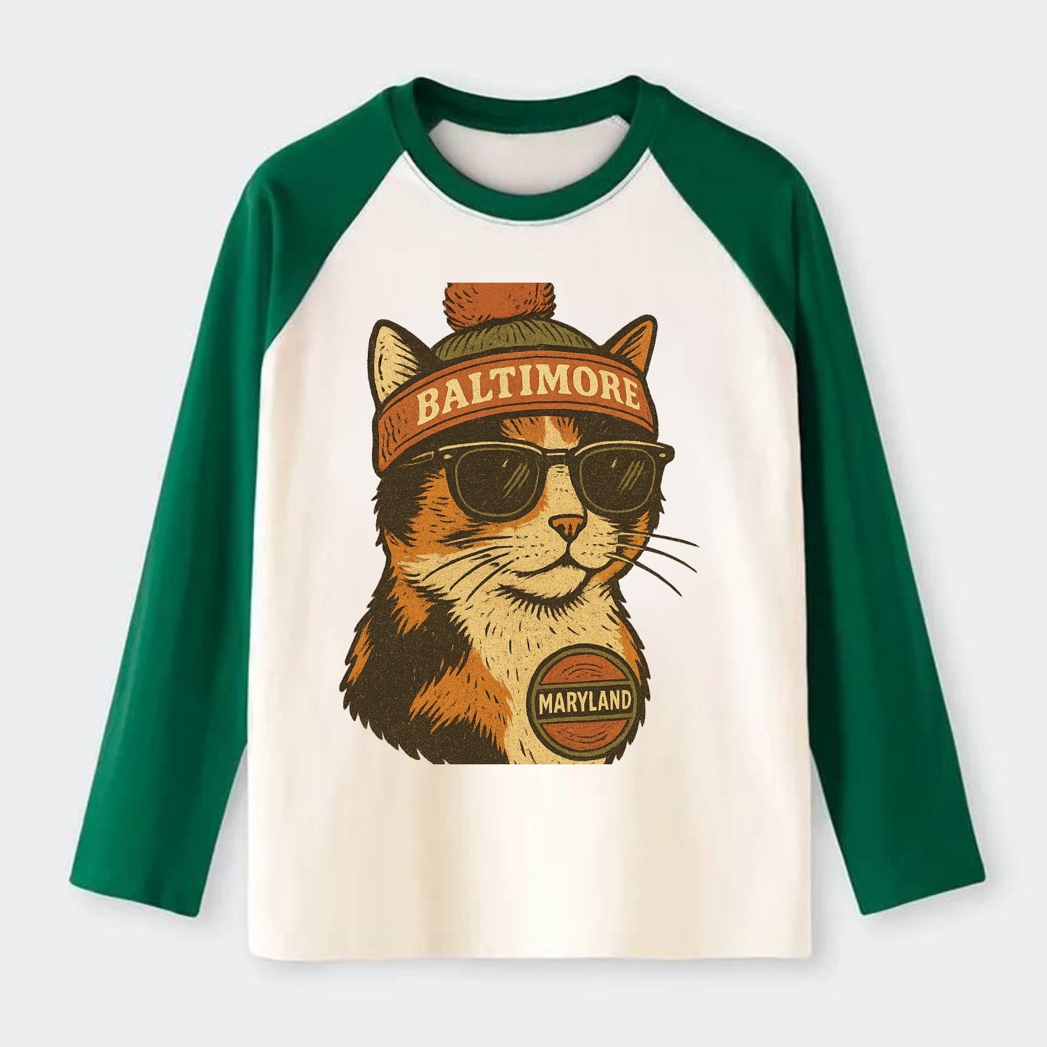 Maryland Calico Cat wearing Baltimore beanie with pom pom and wayfarer - Raglan Long Sleeve T-Shirt - Green