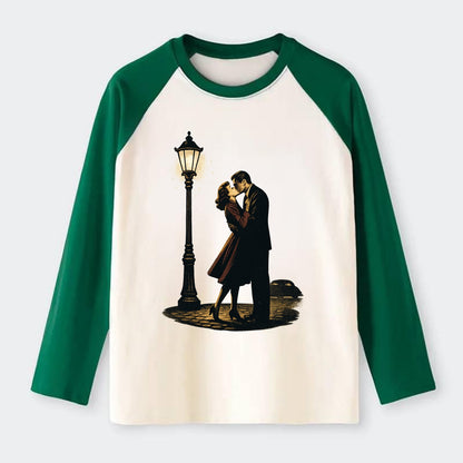 first kiss under vintage street lamp on cobblestone at night - Raglan Long Sleeve T-Shirt - Green