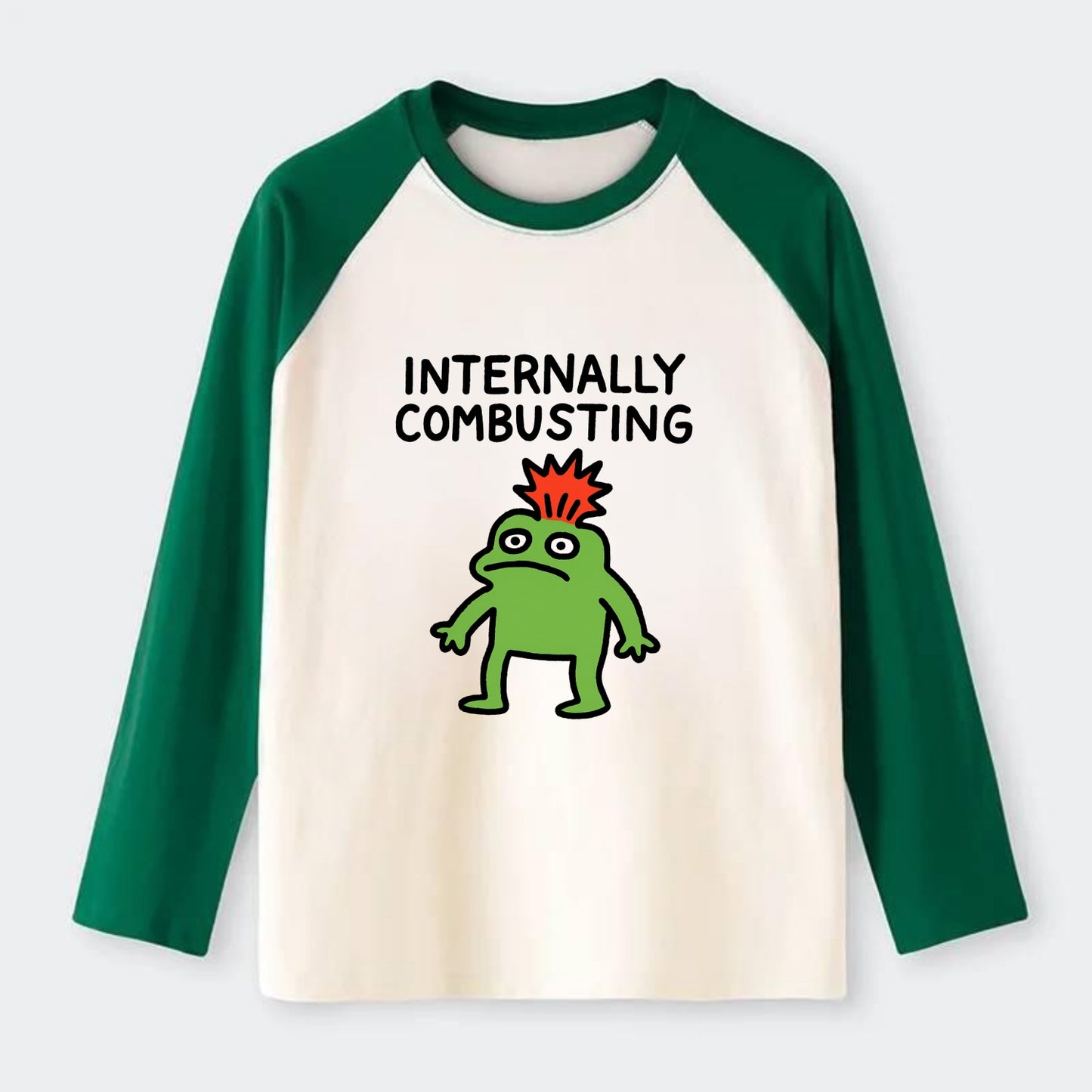 INTERNALLY COMBUSTING | Calm exterior exploding inside - Raglan Long Sleeve T-Shirt - Green