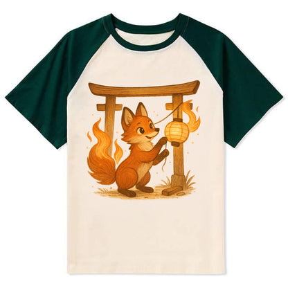 Foxfire kitsune stringing lanterns along a torii gate with tails of - Contrast Raglan T-shirt - Green