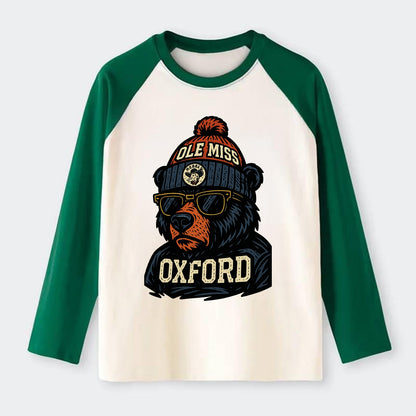 Oxford Black Bear wearing Ole Miss beanie with rebel patch - Raglan Long Sleeve T-Shirt - Green
