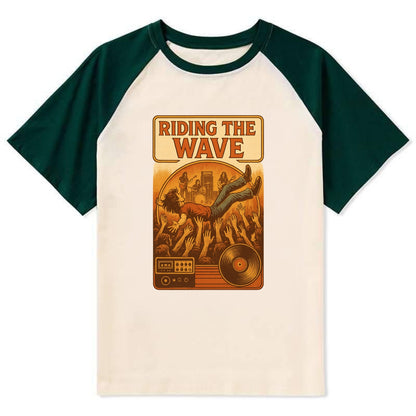 Crowd surfing at packed concert - "Riding the Wave" - concert energy - Contrast Raglan T-shirt - Green
