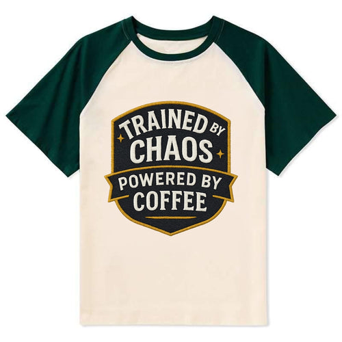 Trained by chaos, powered by coffee - Contrast Raglan T-shirt