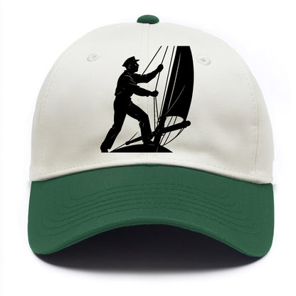 Sailor adjusting the boom on a sailboat - Two Tone Cap - Green