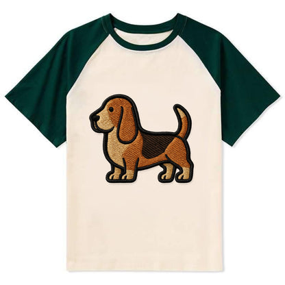 Basset Hound - Trendy low-rider design with prominent black outline - Contrast Raglan T-shirt - Green