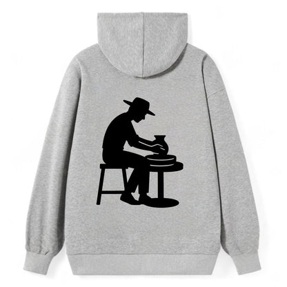Potter shaping clay on wheel - Classic Pullover Hoodie - Grey