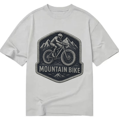 Mountain bike with rugged tires - cyclist badge - Classic T-shirt - Grey