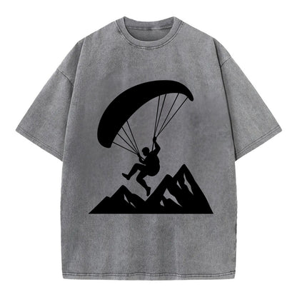 Paraglider soaring over mountain peaks - Vintage T-shirt - Grey