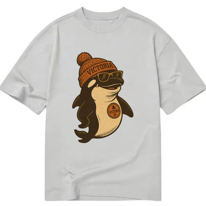 Victoria Orca wearing Victoria beanie with pom pom and wayfarer sunglasses - Classic T-shirt - Grey