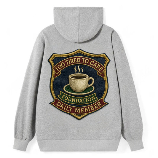 Crest with coffee cup - "Too Tired To Care Foundation - Daily Member" - - Classic Pullover Hoodie - Grey