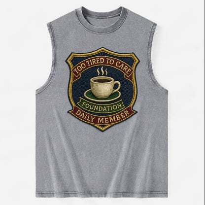 Crest with coffee cup - "Too Tired To Care Foundation - Daily Member" - - Vintage Washed Tank - Grey