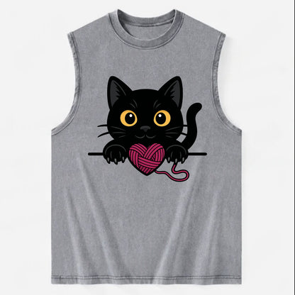Midnight the black cat stretching tall with claws gently hooked over the edge. - Vintage Washed Tank - Grey