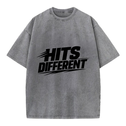 Bold typography design - "HITS DIFFERENT" - uniquely special, stands out - Vintage T-shirt - Grey