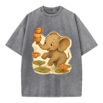 Elephant balancing teacups during a floating tea ceremony beside lotus ponds - Vintage T-shirt - Grey