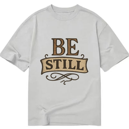 Bold typography design - "BE STILL" - quiet mind, meditation, inner peace - Classic T-shirt - Grey