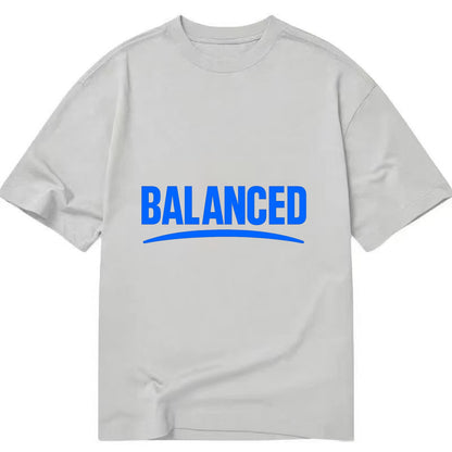 Bold typography design - "BALANCED" - harmony, equilibrium, centered life - Classic T-shirt - Grey