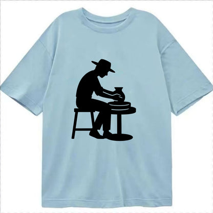 Potter shaping clay on wheel - Classic T-shirt - Light Blue