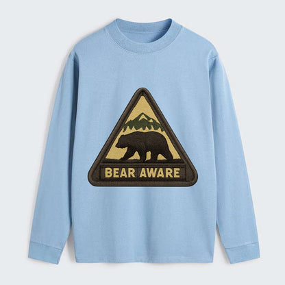 BEAR AWARE - bear silhouette warning in brown and yellow , wilderness - Classic Long Sleeve Shirt - Light Blue