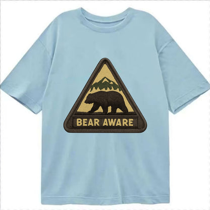BEAR AWARE - bear silhouette warning in brown and yellow , wilderness safety - Classic T-shirt - Light Blue