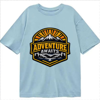 ADVENTURE AWAITS - mountain sunrise with text in gold and blue , wanderlust - Classic T-shirt - Light Blue