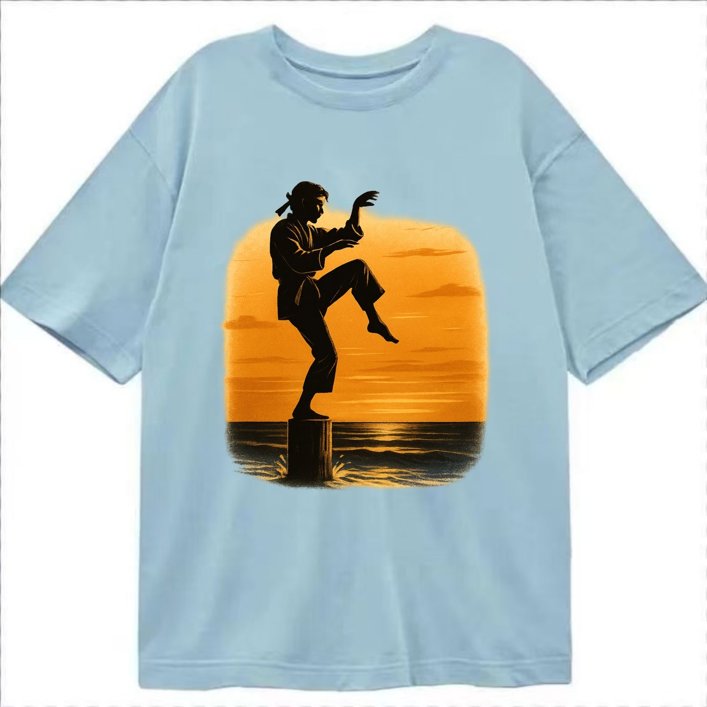 karate crane kick pose on wooden post at beach sunset - Classic T-shirt - Light Blue