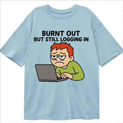 Burnt out person still typing - "Burnt out but still logging in" - hustle culture - Classic T-shirt - Light Blue