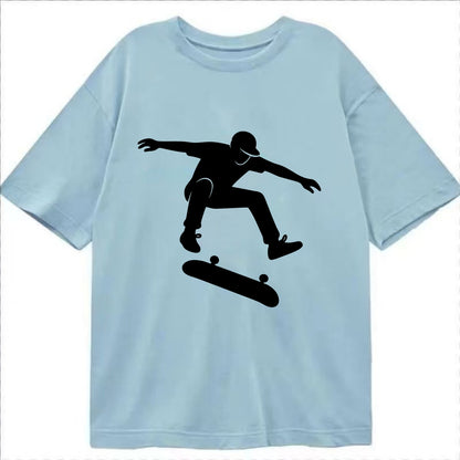 Skateboarder doing kickflip trick - Classic T-shirt - Light Blue