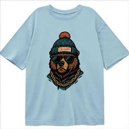 Calgary Grizzly Bear wearing Calgary beanie with pom pom and wayfarer sunglasses - Classic T-shirt - Light Blue