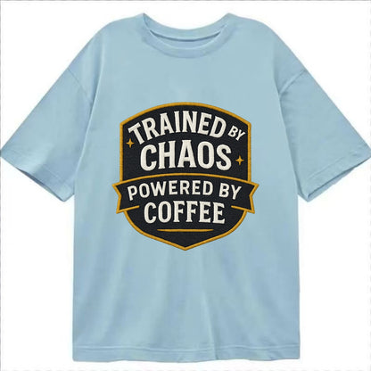 Trained by chaos, powered by coffee - Classic T-shirt - Light Blue