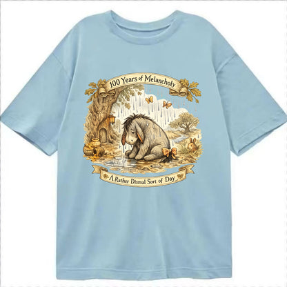 GLOOMY GLEN | Droopy figure in rain | Tattered tail bow | Pessimistic poetry | - Classic T-shirt - Light Blue