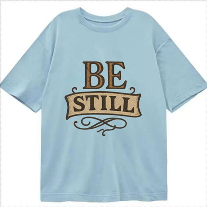 Bold typography design - "BE STILL" - quiet mind, meditation, inner peace - Classic T-shirt - Light Blue