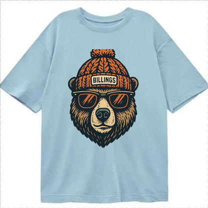 Montana Grizzly Bear wearing Billings beanie with pom pom and wayfarer sunglasses - Classic T-shirt - Light Blue