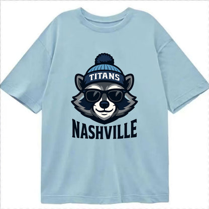 Nashville Raccoon wearing Titans navy and light blue beanie with pom pom and - Classic T-shirt - Light Blue