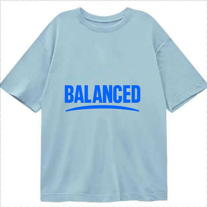 Bold typography design - "BALANCED" - harmony, equilibrium, centered life - Classic T-shirt - Light Blue