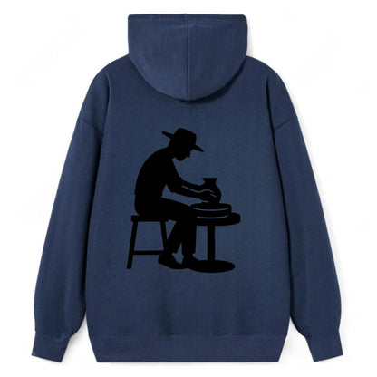 Potter shaping clay on wheel - Classic Pullover Hoodie - Navy