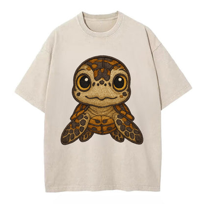 Baby Hawksbill Turtle - amber and brown shell pattern, curious golden eyes, - Vintage T-shirt - Off White